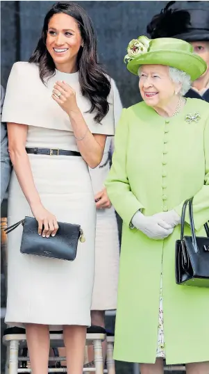  ??  ?? Cheery across the Mersey...Meghan and the Queen open the new crossing