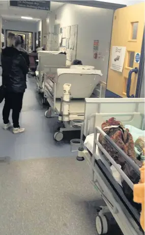  ??  ?? Lucinda Wilcox took this photo of people waiting on trolleys, one evening last week, in the A&E department at the Royal Glamorgan Hospital, near Llantrisan­t