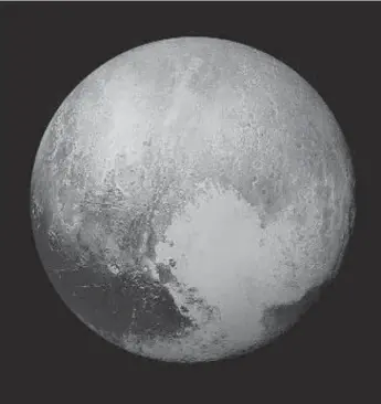  ?? NASA/THE ASSOCIATED PRESS ?? This image of Pluto was made by combining several images from two cameras on the New Horizons spacecraft.