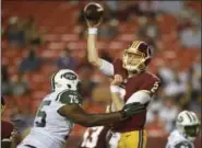  ?? NICK WASS — THE ASSOCIATED PRESS ?? Eagles quarterbac­k Nate Sudfeld (2) was selected by the Redskins in the 2016 NFL Draft.