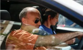  ?? Photograph: Hollie Adams/Getty Images ?? Dominic Cummings and his wife, Mary Wakefield, leaving his home in London on 23 May.