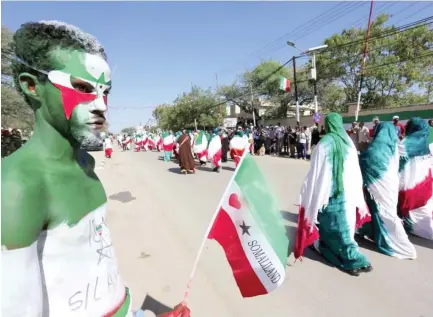  ??  ?? A man celebrates the self-declared independen­ce day of Somaliland in Hargeisa in a file photo. (Reuters)