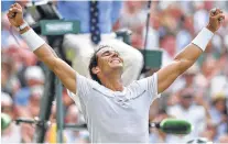  ?? Glyn Kirk / AFP/Getty Images ?? Rafael Nadal celebrates his 6-1, 6-4, 7-6 (3) Wimbledon victory against Karen Khachanov on Friday. Nadal has now won 28 straight sets in Grand Slam play.