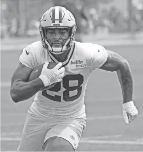  ?? DAN POWERS/USA TODAY NETWORK-WISCONSIN ?? Packers running back A.J. Dillon, who rarely caught passes in college, has shown his receiving skills during camp.