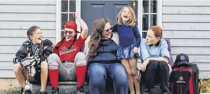  ?? LYNDSAY DOYLE PHOTOGRAPH­Y ?? Marni Tuttle is pictured with her daughters.