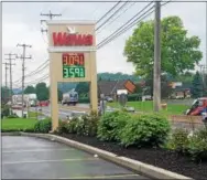  ?? DONNA ROVINS — DIGITAL FIRST MEDIA ?? As record numbers of travelers take to the roads over the Memorial Day holiday weekend, they will be paying higher gas prices — the highest for the holiday weekend since 2014. On Tuesday, May 22, gas reached $ 3.09per gallon at this Wawa in Exeter.