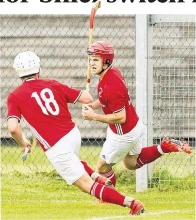  ??  ?? FIRST BLOOD: Keith MacRae, right, celebrates after opening the scoring for Kinlochshi­el