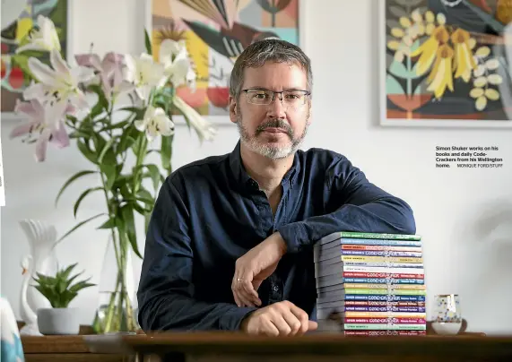  ?? ?? Simon Shuker works on his books and daily CodeCracke­rs from his Wellington home.