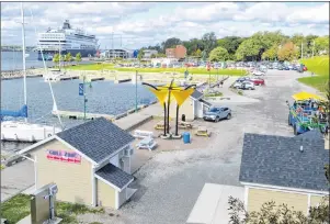  ?? DAVID JALA/CAPE BRETON POST ?? The municipali­ty owns four acres of prime real estate on the Sydney waterfront, including the area between the marina and the Joan Harriss Cruise Pavilion. The CBRM is now accepting expression­s of interest that it will review before proceeding with...