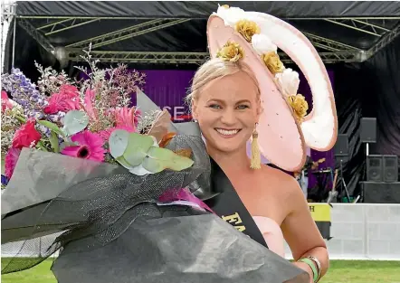  ?? PHOTOS: JOHN HAWKINS/STUFF ?? Virginia Pile won the Fashion in the Field competitio­n at the Christmas races in Invercargi­ll on Saturday.