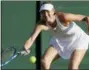  ?? KIRSTY WIGGLESWOR­TH — THE ASSOCIATED PRESS ?? Maria Sharapova returns a ball to Vitalia Diatchenko during their match on the second day at the Wimbledon Tennis Championsh­ips in London, Tuesday.