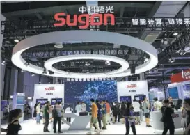  ?? PROVIDED TO CHINA DAILY ?? Visitors flock to supercompu­ter manufactur­er Sugon’s booth during the World Artificial Intelligen­ce Conference in Shanghai last July.