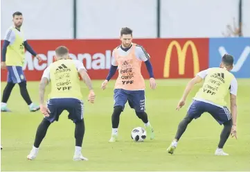  ??  ?? Messi (second right) takes part in a training session at the team’s base camp in Bronnitsy, near Moscow, Russia ahead of the Russia 2018 World Cup football tournament. — AFP photo