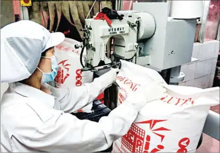  ?? VIETNAM NEWS AGENCY/VIET NAM NEWS ?? Refined sugar is packaged at KCP Vietnam Industries in the Vietnamese coastal province of Phu Yen.