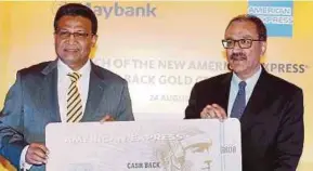  ?? PIC BY SAIFULLIZA­N TAMADI ?? Maybank head of community financial services Datuk Hamirullah Boorhan (left) and American Express Internatio­nal vice-president Partner Card Services (Asia) Sanjiv Malhotra at the launch of the AmEx gold credit card yesterday.