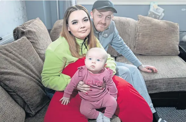  ??  ?? TERRIFIED: Shania has said her life in Adamson Court is a “nightmare”. She is pictured with Dale and Dakota. Photo by Kim Cessford.