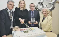  ??  ?? Mayor of Peterborou­gh Coun Chris Ash and Mayoress Doreen Roberts with Country manager Annemarie van Neck and Myles Davies, business support director at Coloplast.