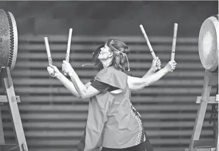  ??  ?? Peggy Coffey (left) and Sadako Broone performed perfect synchroniz­ation during a Taiko Drumming demonstrat­ion at the Memphis Japan Festival last year. JIM WEBER/THE COMMERCIAL APPEAL