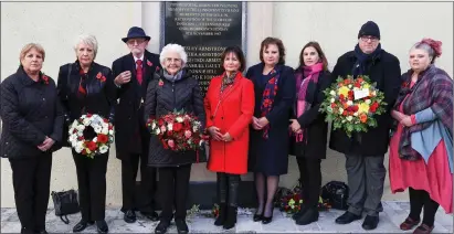  ?? ?? Attending the 35th anniversar­y of the Enniskille­n Bomb at the new site of the memorial are Joan Anderson and Margaret Veitch (daughters of William and Agnes Mullan); Jim Dixon, the most seriously injured person to survive the bomb, and his wife, Anna; Pam Whitley, Stella Robinson, Moyna Nesbitt and Julian Armstrong (children of Wesley and Bertha Armstrong); and Aileen Quinton (daughter of Alberta Quinton).