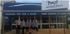  ??  ?? Bradley Frohloff and staff outside Frohlies Meats in Yarraman.