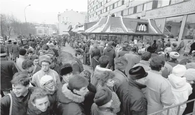  ?? AP ?? Thousands of Muscovites line up Jan. 31, 1990 — opening day — outside the first McDonald’s restaurant in the then-Soviet Union.