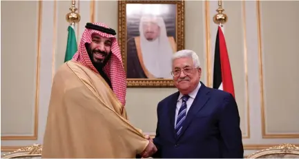  ?? (PPO/Reuters) ?? SAUDI ARABIA’S Crown Prince Muhammad bin Salman greets Palestinia­n Authority President Mahmoud Abbas in Riyadh last Thursday.