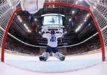  ?? BRUCE BENNETT/GETTY IMAGES ?? Europe’s Jaroslav Halak celebrates an overtime win over Sweden in a World Cup of Hockey semifinal on Sunday.