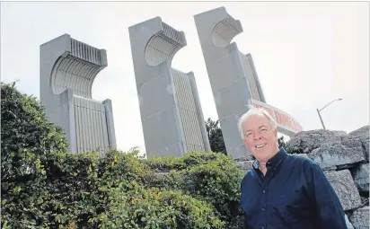  ?? RAY MARTIN CAMBRIDGE TIMES ?? Cambridge Coun. Frank Monteiro stands in front of the fountains located on Hespeler Road in front of Home Depot.