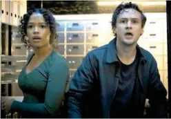  ?? File/associated Press ?? Taylor Russell (left) and Logan Miller in a scene from ‘Escape Room: Tournament of Champions.’