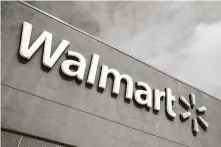  ?? Matt Rourke / Associated Press file photo ?? Walmart announced the company is halting political donations to the lawmakers who voted against certifying election results.