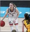  ?? ERIC GAY — THE ASSOCIATED PRESS ?? UConn’s Paige Bueckers, left, works against Iowa’s Caitlin Clark at the Alamodome in San Antonio, Saturday.