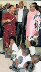  ?? Picture: FREDLIN ADRIAAN ?? FOSTERING LEARNING: At the handover of an IT laboratory at Walmer Primary School are, from left, Choki Majola and MECs Mandla Makupula and Nancy Sihlwayi