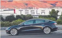  ?? Tesla ?? Tesla’s Model 3, the “affordable luxury” $35,000-and-up sedan has been preordered by 450,000 people.