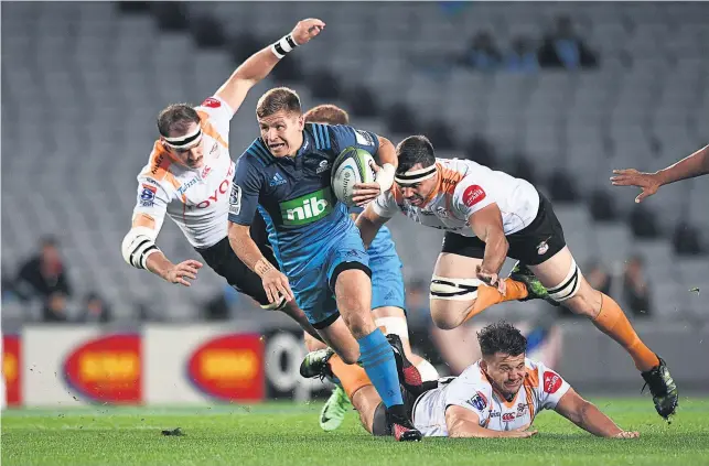  ?? Picture / Photosport ?? Piers Francis makes a break against the Cheetahs at Eden Park.