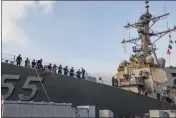  ?? SPC. JASON PASTRICK — U.S. NAVY VIA AP, FILE ?? Sailors aboard the guided missile destroyer USS Stout handle mooring lines during the ship’s return to home port at Naval Station Norfolk in Norfolk, Va., on Oct. 12, 2020.