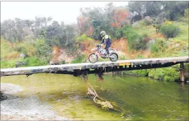  ??  ?? NARROW bridges provided access across deeper gullies.