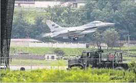  ?? HONG KI-WON/AP ?? A U.S. F-16 prepares to touch down Thursday at the Osan Air Base in South Korea.