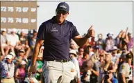  ?? Chris Carlson / Associated Press ?? Phil Mickelson celebrates after winning the final round at the 2021 PGA Championsh­ip in Kiawah Island, S.C.