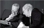  ?? ASSOCIATED PRESS ?? SENATE MINORITY LEADER CHARLES SCHUMER, D-N.Y., (left) talks with Senate Majority Leader Mitch McConnell, R-Ky., before his speech at the McConnell Center’s Distinguis­hed Speaker Series on Monday in Louisville, Ky.