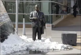  ?? PAUL BATTAGLIA - THE ASSOCIATED PRESS ?? FILE - In this April 17, 2014, file photo, a statue of former Twins’ owner Calvin Griffith stands in the snow outside Target Field before a baseball game between the Minnesota Twins and the Toronto Blue Jays in Minneapoli­s.