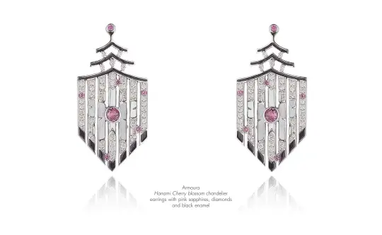  ??  ?? Armoura Hanami Cherry blossom chandelier earrings with pink sapphires, diamonds and black enamel