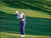  ?? GERALD HERBERT/ASSOCIATED PRESS ?? Lee Westwood had a bogey-free round at The Players Championsh­ip on Friday, with two birdies at the start and a nifty pitch to a troublesom­e pin on the par-5 ninth in Ponte Vedra Beach, Fla.