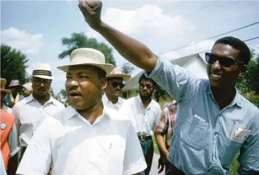  ?? BOB FITCH, STANFORD UNIVERSITY LIBRARIES/ HBO ?? This 1966 image shows Rev. Martin Luther King Jr. ( left) and Stokely Carmichael in Jackson, Mississipp­i, at the Meredith March, as seen in the documentar­y “King in theWildern­ess.”