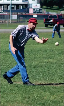  ??  ?? John “Sole Man” Neal hurls the “onion” toward the dish for the Lightfoot Club of Chattanoog­a during their vintage base ball match in Fort Oglethorpe this past Saturday. The Lightfoot beat the Quicksteps of Spring Hill, Tenn., 8-5. (Catoosa County News...