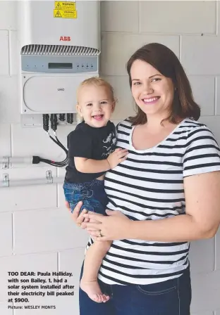  ?? Picture: WESLEY MONTS ?? TOO DEAR: Paula Halliday, with son Bailey, 1, had a solar system installed after their electricit­y bill peaked at $ 900.