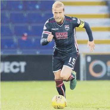  ??  ?? Andrew Davies is convinced there is still enough fight in the Ross County team to avoid relegation.