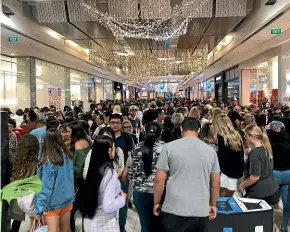  ??  ?? Boxing Day sales drew thousands to Auckland’s Sylvia Park mall, prompting warnings of significan­t congestion on the roads.