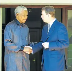  ?? Picture: KATHERINE MUICK-MERE ?? ROYAL EXCHANGE: Nelson Mandela welcomed numerous world dignitarie­s to his Houghton home. Here he meets Prince Andrew