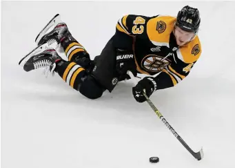  ?? STUART CAHILL / BOSTON HERALD ?? NEW DEAL ON ICE: Danton Heinen avoided arbitratio­n when the restricted free agent signed a two-year contract with the Bruins earlier this week.