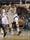  ?? MORRY GASH, THE ASSOCIATED PRESS ?? Giannis Antetokoun­mpo scorched the Raptors last time with 29 points.